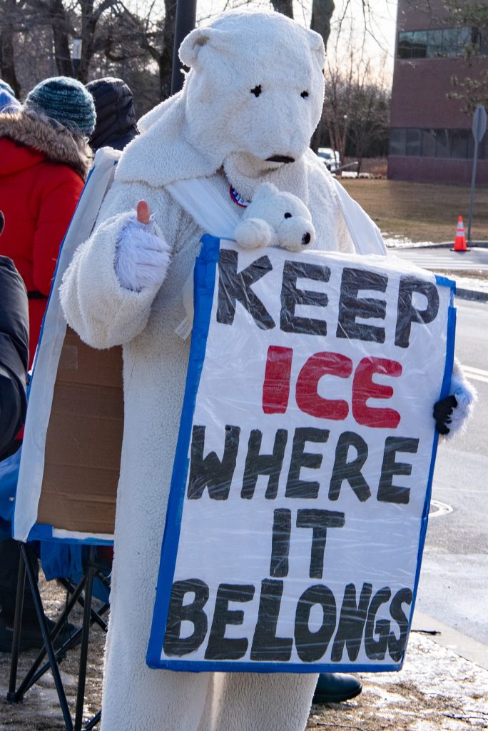 Polar Bear with sign: Keep ICE where it belongs
