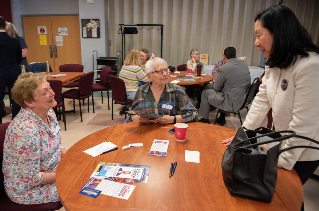 Macy Lee speaks with voters