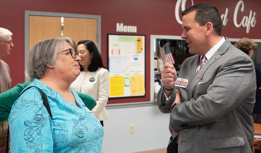 Greg Connor speaks to voters